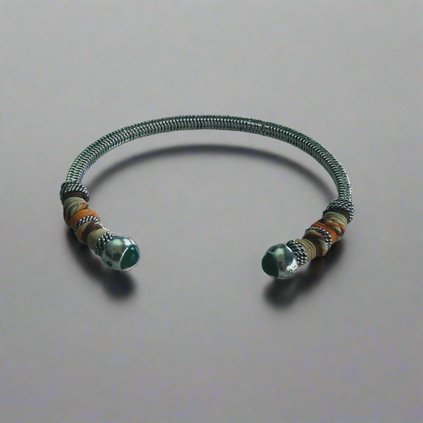 This adjustable bangle offers both style and versatility, with a width of 0.7cms and a circumference of 16.5cms. Elevate your wrist with this exquisite piece, perfect for adding a touch of artisanal charm to any ensemble.